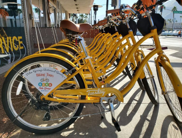 row of yellow bikes