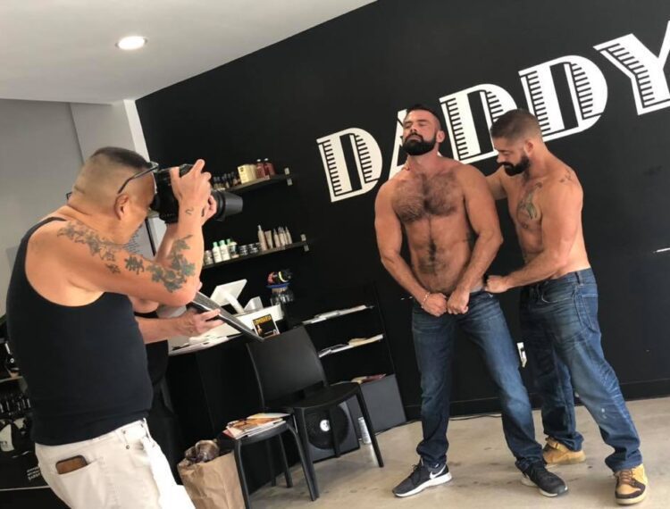 men inside Daddys barber shop