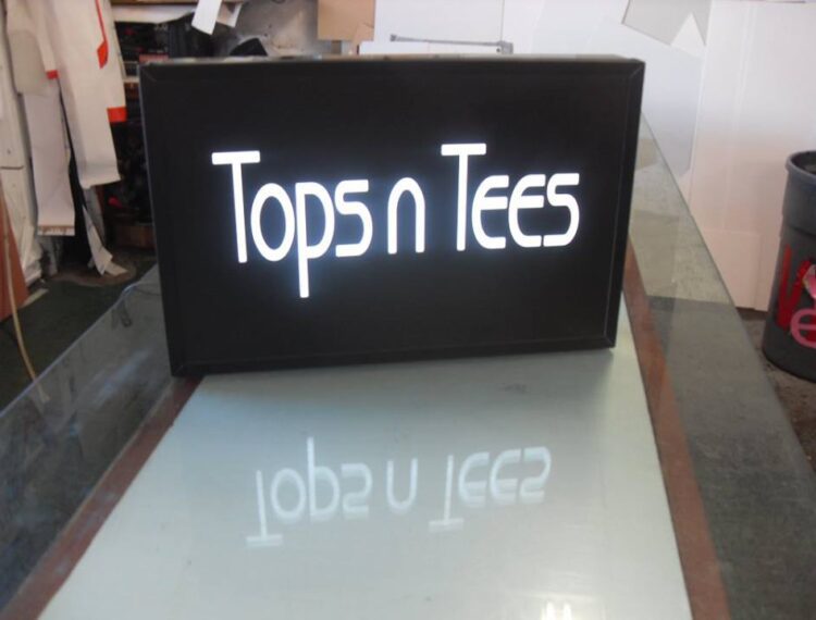 Tops n Tees sign