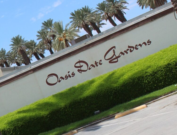 Oasis Date Garden sign