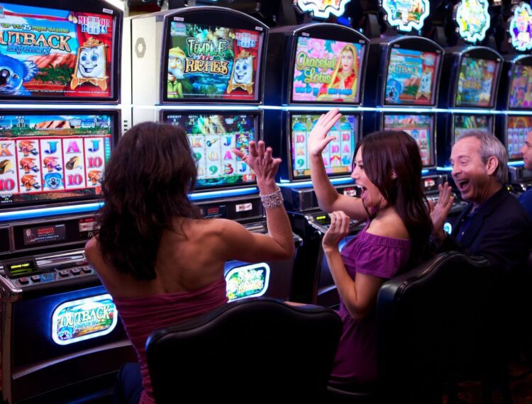 people playing slot machines