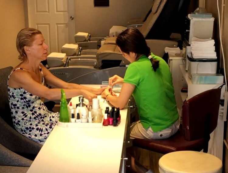 person getting manicure