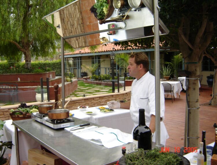 Andrew Copley at outdoor cooking station