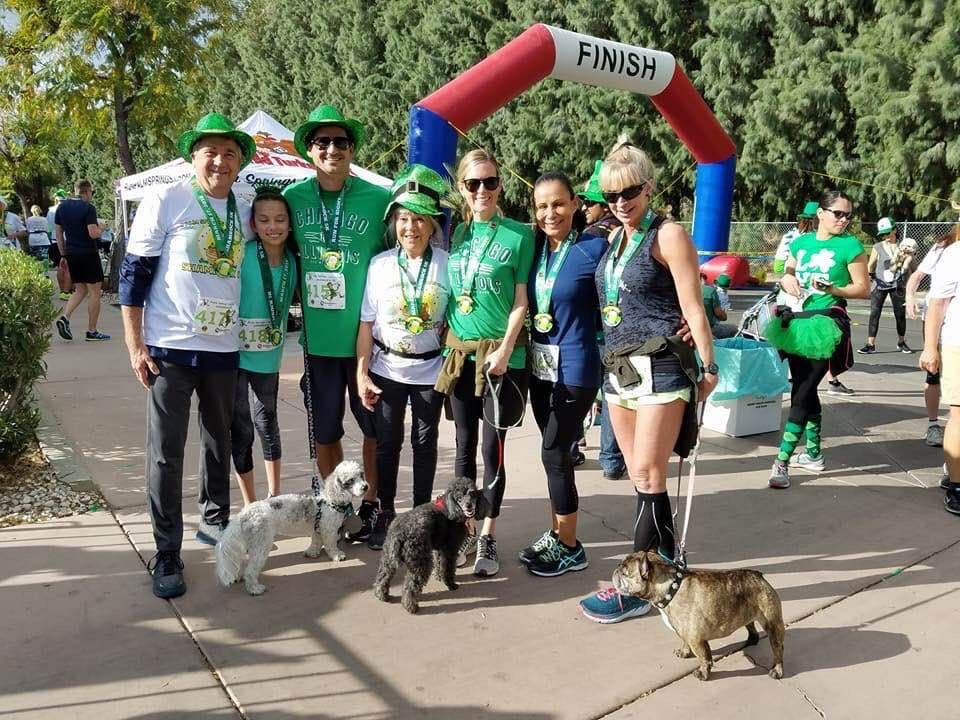 Participants and their pups at the Shamrock 5K